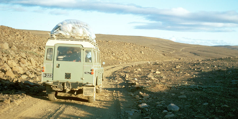 Land Rover on a barren gravel road in Northern Iceland 1972.